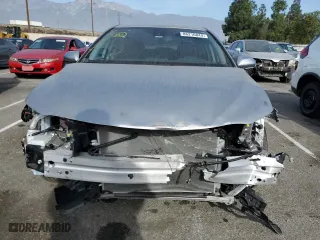 2024 Toyota Camry LE with VIN 4T1C11AK7RU898436, listed as a Copart auction lot 86216844 with 5,201 mi miles and Salvage Title. Bid and sale history available at carsss.com. Image 5.