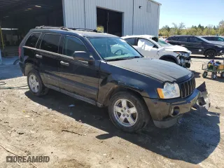 2005 Jeep Grand Cherokee Laredo with VIN 1J4HS48N05C727062, listed as a Copart auction lot 49236085 with 0 mi miles and Salvage Title. Bid and sale history available at carsss.com. Image 4.