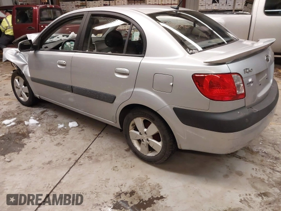 2009 Kia Rio LX with VIN KNADE223596444133, listed as a IAAI auction lot 41598865 with Not Provided miles and . Bid and sale history available at DreamBid. Image 3.
