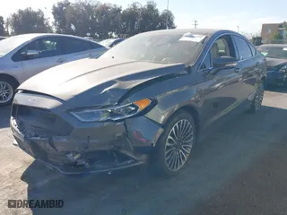 2017 Ford Fusion Energi Titanium with VIN 3FA6P0SU5HR105477, listed as a IAAI auction lot 41072696 with 92,926 mi miles. Bid and sale history available at carsss.com. Image 2.