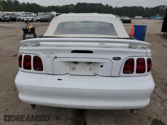 1998 Ford Mustang with VIN 1FAFP4442WF180149, listed as a Copart auction lot 51080475 with 103,736 mi miles and Salvage Title. Bid and sale history available at carsss.com. Image 6.