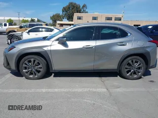 2021 Lexus UX 250h F Sport with VIN JTHR9JBH0M2037127, listed as a IAAI auction lot 42156811 with 20,720 mi miles and . Bid and sale history available at DreamBid. Image 14.