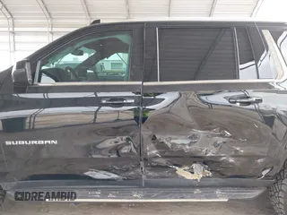 2021 Chevrolet Suburban LT z VIN 1GNSCCKDXMR421833, wystawiony jako IAAI lot #41738389 z przebiegiem 56 757 mil mil oraz . Historia ofert i sprzedaży dostępna na DreamBid. Obrazek 14.
