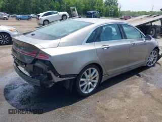 2016 Lincoln MKZ z VIN 3LN6L2J97GR617086, wystawiony jako IAAI lot #42446924 z przebiegiem 107 591 mil mil oraz . Historia ofert i sprzedaży dostępna na DreamBid. Obrazek 4.