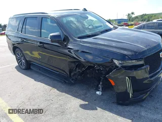 2023 Cadillac Escalade 4WD Sport z VIN 1GYS4EKLXPR513435, wystawiony jako IAAI lot #42137452 z przebiegiem 27 495 mil mil oraz . Historia ofert i sprzedaży dostępna na DreamBid. Obrazek 6.