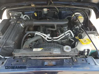 2003 Jeep Wrangler Sport z VIN 1J4FA49S13P347815, wystawiony jako Copart lot #59536685 z przebiegiem 74 298 mil mil oraz Szkoda całkowita • Salvage title. Historia ofert i sprzedaży dostępna na DreamBid. Obrazek 12.