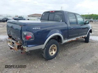 2003 Ford F-150 XLT with VIN 1FTRW08L63KD55851, listed as a IAAI auction lot 42359388 with Not provided miles and . Bid and sale history available at DreamBid. Image 4.
