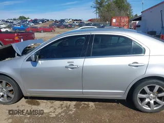 2011 Mercury Milan Premier z VIN 3MEHM0JG0BR604846, wystawiony jako IAAI lot #41596439 z przebiegiem 238 478 mil mil oraz . Historia ofert i sprzedaży dostępna na DreamBid. Obrazek 15.