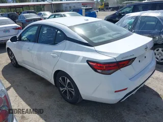 2021 Nissan Sentra SV with VIN 3N1AB8CV1MY285892, listed as a IAAI auction lot 42203454 with 56,147 mi miles and . Bid and sale history available at DreamBid. Image 3.