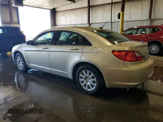 2010 Chrysler Sebring Touring with VIN 1C3CC4FB2AN183821, listed as a Copart auction lot 55239615 with 26,094 mi miles and Salvage Title. Bid and sale history available at DreamBid. Image 2.