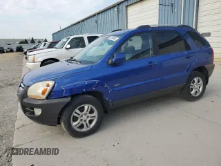 2005 Kia Sportage LX z VIN KNDJE723157090537, wystawiony jako Copart lot #60168945 z przebiegiem 156 399 mil mil oraz Czysty tytuł • Clean title. Historia ofert i sprzedaży dostępna na DreamBid. Obrazek 1.
