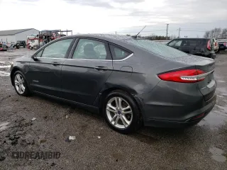 2018 Ford Fusion Hybrid SE with VIN 3FA6P0LU9JR261090, listed as a Copart auction lot 73309152 with 147,699 mi miles. Bid and sale history available at carsss.com. Image 2.
