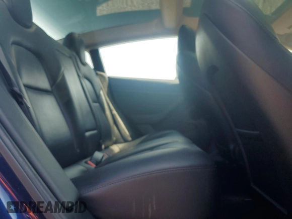 2023 Tesla Model 3 z VIN 5YJ3E1EA0PF450250, wystawiony jako Copart lot #64609205 z przebiegiem 80 240 mil mil oraz Czysty tytuł • Clean title. Historia ofert i sprzedaży dostępna na DreamBid. Obrazek 10.