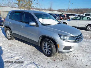 2014 Volkswagen Tiguan SEL with VIN WVGAV3AX8EW044184, listed as a IAAI auction lot 41358772 with 138,096 mi miles and . Bid and sale history available at DreamBid. Image 1.