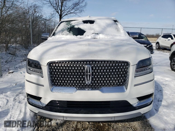 2021 Lincoln Navigator Black Label z VIN 5LMJJ3TTXMEL00316, wystawiony jako Copart lot #44690355 z przebiegiem 20 296 mil mil oraz Szkoda całkowita • Salvage title. Historia ofert i sprzedaży dostępna na DreamBid. Obrazek 5.