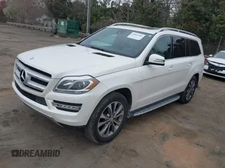 2016 Mercedes-Benz GL with VIN 4JGDF6EE7GA673861, listed as a IAAI auction lot 41803302 with 74,670 mi miles. Bid and sale history available at carsss.com. Image 2.