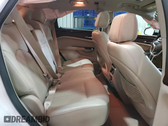2016 Cadillac SRX Performance Collection with VIN 3GYFNCE36GS525836, listed as a Copart auction lot 84502634 with 94,639 mi miles and Salvage title. Bid and sale history available at DreamBid. Image 12.