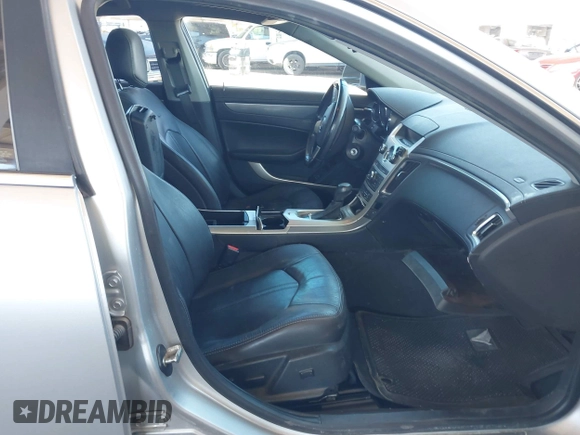2013 Cadillac CTS Luxury with VIN 1G6DE5E52D0156666, listed as a IAAI auction lot 42058687 with 120,659 mi miles and . Bid and sale history available at DreamBid. Image 5.