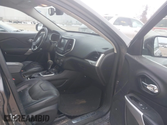 2018 Jeep Cherokee Overland with VIN 1C4PJMJX5JD594240, listed as a IAAI auction lot 41285832 with 130,334 mi miles. Bid and sale history available at carsss.com. Image 5.