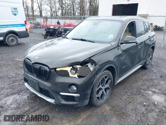 2018 BMW X1 xDrive28i with VIN WBXHT3C34J5K31430, listed as a IAAI auction lot 41954792 with 125,447 mi miles. Bid and sale history available at carsss.com. Image 6.