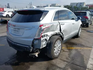 2017 Cadillac XT5 FWD with VIN 1GYKNARS7HZ144148, listed as a IAAI auction lot 41392399 with 96,252 mi miles and . Bid and sale history available at carsss.com. Image 4.