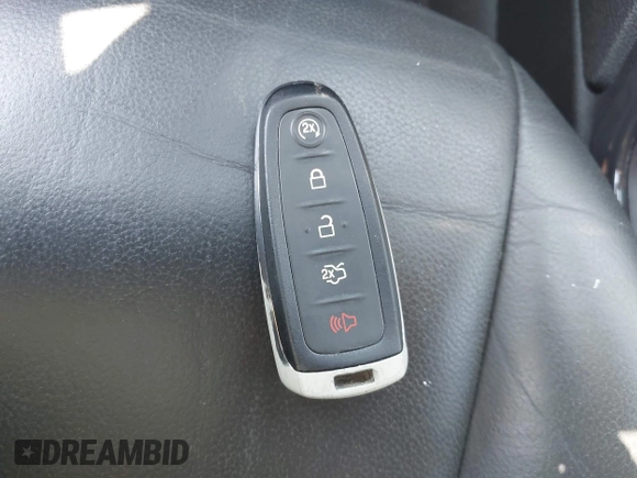 2015 Ford Escape Titanium with VIN 1FMCU9J96FUB58519, listed as a IAAI auction lot 42429369 with 125,541 mi miles and . Bid and sale history available at DreamBid. Image 11.
