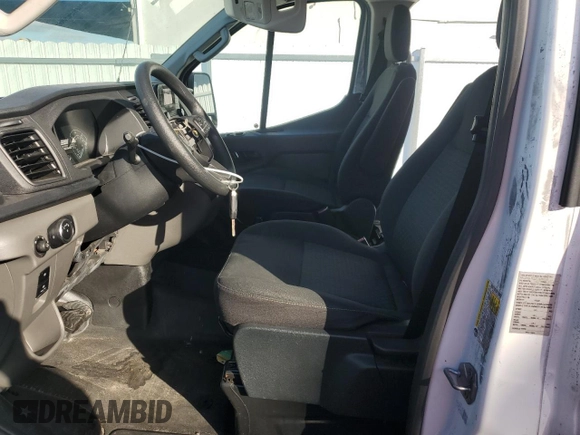 2023 Ford Transit Cargo with VIN 1FTBR1Y8XPKB11653, listed as a Copart auction lot 84255434 with Not Provided miles and Clean Title. Bid and sale history available at DreamBid. Image 7.