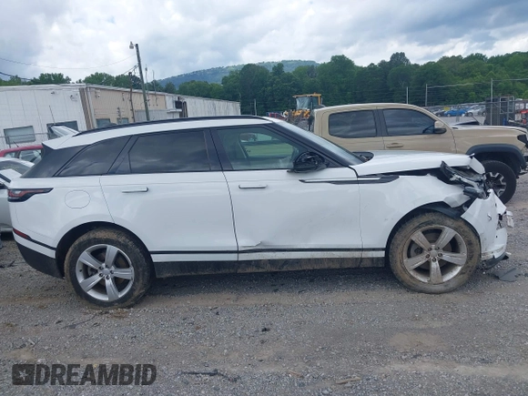 2020 Land Rover Range Rover Velar S z VIN SALYB2EX2LA256971, wystawiony jako IAAI lot #42525724 z przebiegiem 76 802 mil mil oraz . Historia ofert i sprzedaży dostępna na DreamBid. Obrazek 13.