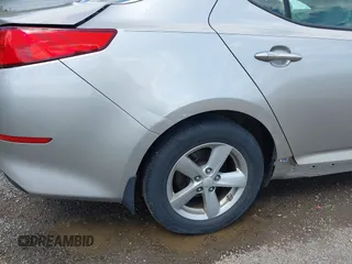 2015 Kia Optima LX z VIN 5XXGM4A70FG392359, wystawiony jako IAAI lot #42232025 z przebiegiem 192 636 mil mil oraz . Historia ofert i sprzedaży dostępna na DreamBid. Obrazek 20.