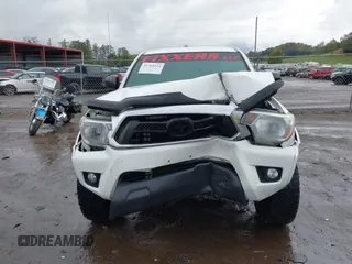 2014 Toyota Tacoma with VIN 3TMLU4EN9EM140999, listed as a IAAI auction lot 37765514 with 168,875 mi miles. Bid and sale history available at carsss.com. Image 12.