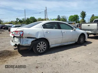2010 Mitsubishi Galant FE z VIN 4A32B2FF1AE012718, wystawiony jako Copart lot #54487945 z przebiegiem 132 109 mil mil oraz Szkody całkowita. Historia ofert i sprzedaży dostępna na DreamBid. Obrazek 3.