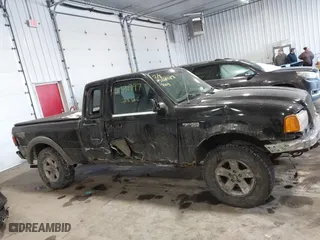 2003 Ford Ranger XL Fleet with VIN 1FTZR45EX3PA60520, listed as a IAAI auction lot 41591797 with 205,040 mi miles. Bid and sale history available at carsss.com. Image 13.