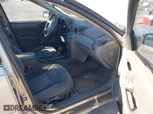 2000 Pontiac Grand Am SE z VIN 1G2NE52T8YM712695, wystawiony jako IAAI lot #41855853 z przebiegiem 63 914 mil mil oraz . Historia ofert i sprzedaży dostępna na DreamBid. Obrazek 5.