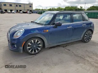 2016 MINI Hardtop 4 Door with VIN WMWXU1C51G2D57816, listed as a Copart auction lot 62648455 with 60,276 mi miles and Salvage title. Bid and sale history available at DreamBid. Image 1.
