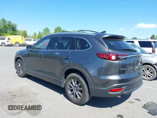 2021 Mazda CX-9 Touring with VIN JM3TCACY7M0503484, listed as a IAAI auction lot 42013262 with 63,777 mi miles and . Bid and sale history available at DreamBid. Image 3.