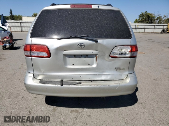 2002 Toyota Sienna LE with VIN 4T3ZF13CX2U458385, listed as a Copart auction lot 69523254 with 187,836 mi miles and Salvage Title. Bid and sale history available at carsss.com. Image 6.