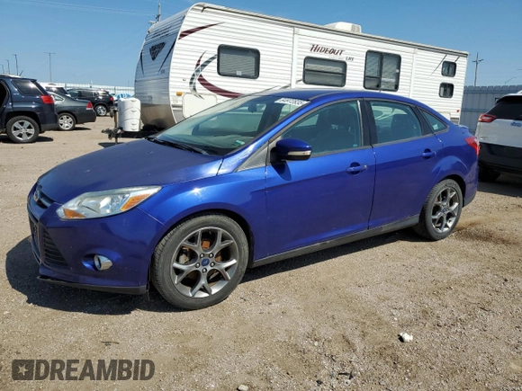 2013 Ford Focus SE with VIN 1FADP3F29DL352186, listed as a Copart auction lot 64972835 with 74,409 mi miles and Clean title. Bid and sale history available at DreamBid. Image 1.