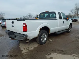 2011 Ford Super Duty F-250 SRW XL with VIN 1FT7X2A6XBEA52525, listed as a IAAI auction lot 41589289 with 313,380 mi miles. Bid and sale history available at carsss.com. Image 4.