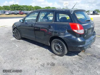 2003 Toyota Matrix Std with VIN 2T1KR32E63C116953, listed as a IAAI auction lot 41929877 with 299,999 mi miles. Bid and sale history available at carsss.com. Image 3.