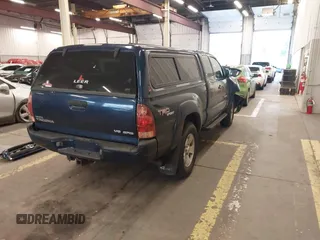 2006 Toyota Tacoma with VIN 5TEUU42N06Z265256, listed as a IAAI auction lot 41371660 with 153,557 mi miles. Bid and sale history available at carsss.com. Image 4.