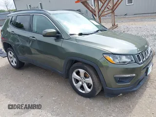 2018 Jeep Compass Latitude z VIN 3C4NJDBB8JT184990, wystawiony jako IAAI lot #42354000 z przebiegiem 77 444 mil mil oraz . Historia ofert i sprzedaży dostępna na DreamBid. Obrazek 1.