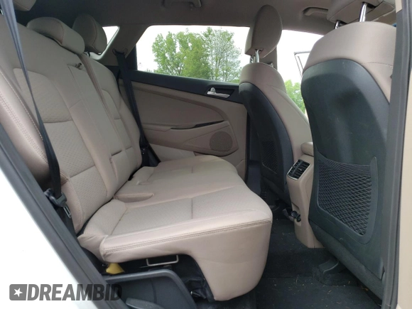 2019 Hyundai Tucson Sport z VIN KM8J3CAL8KU958624, wystawiony jako Copart lot #58581135 z przebiegiem 57 775 mil mil oraz Szkoda całkowita • Salvage title. Historia ofert i sprzedaży dostępna na DreamBid. Obrazek 11.