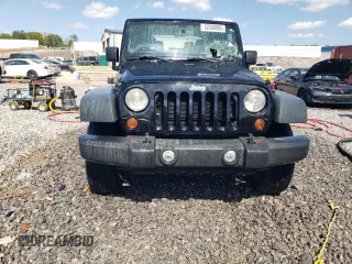 2013 Jeep Wrangler Sport with VIN 1C4AJWAG5DL694110, listed as a Copart auction lot 52200885 with 187,924 mi miles and Salvage Title. Bid and sale history available at carsss.com. Image 5.
