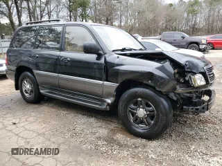 2001 Lexus LX 470 z VIN JTJHT00W613503074, wystawiony jako Copart lot #51959475 z przebiegiem Nie podano mil oraz Nie do naprawy. Historia ofert i sprzedaży dostępna na DreamBid. Obrazek 4.