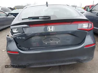 2024 Honda Civic LX z VIN 19XFL2H5XRE023870, wystawiony jako IAAI lot #41776260 z przebiegiem Nie podano mil oraz . Historia ofert i sprzedaży dostępna na DreamBid. Obrazek 15.