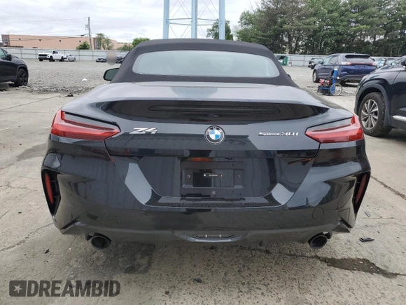 2024 BMW Z4 sDrive30i with VIN WBAHF3C09RWY35844, listed as a Copart auction lot 61809905 with Not provided miles and Salvage title. Bid and sale history available at DreamBid. Image 6.