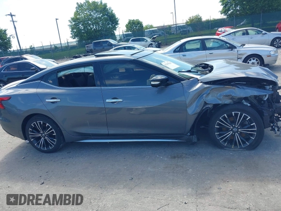 2018 Nissan Maxima SV with VIN 1N4AA6AP2JC385535, listed as a IAAI auction lot 42299100 with 81,431 mi miles and . Bid and sale history available at DreamBid. Image 14.