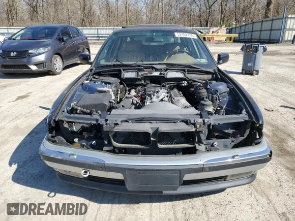 1996 BMW 7 Series 740iL z VIN WBAGJ8328TDL35931, wystawiony jako Copart lot #52402765 z przebiegiem Nie podano mil oraz Czysty tytuł • Clean title. Historia ofert i sprzedaży dostępna na DreamBid. Obrazek 5.