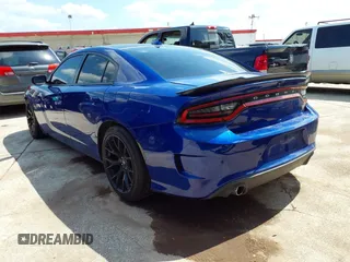 2019 Dodge Charger Scat Pack with VIN 2C3CDXGJ8KH588905, listed as a IAAI auction lot 42211811 with 50,298 mi miles and . Bid and sale history available at carsss.com. Image 3.