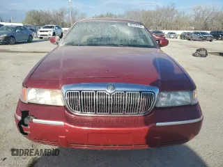 2000 Mercury Grand Marquis LS z VIN 2MEFM75W9YX641907, wystawiony jako Copart lot #50722975 z przebiegiem 152 108 mil mil oraz Szkody całkowita. Historia ofert i sprzedaży dostępna na DreamBid. Obrazek 5.